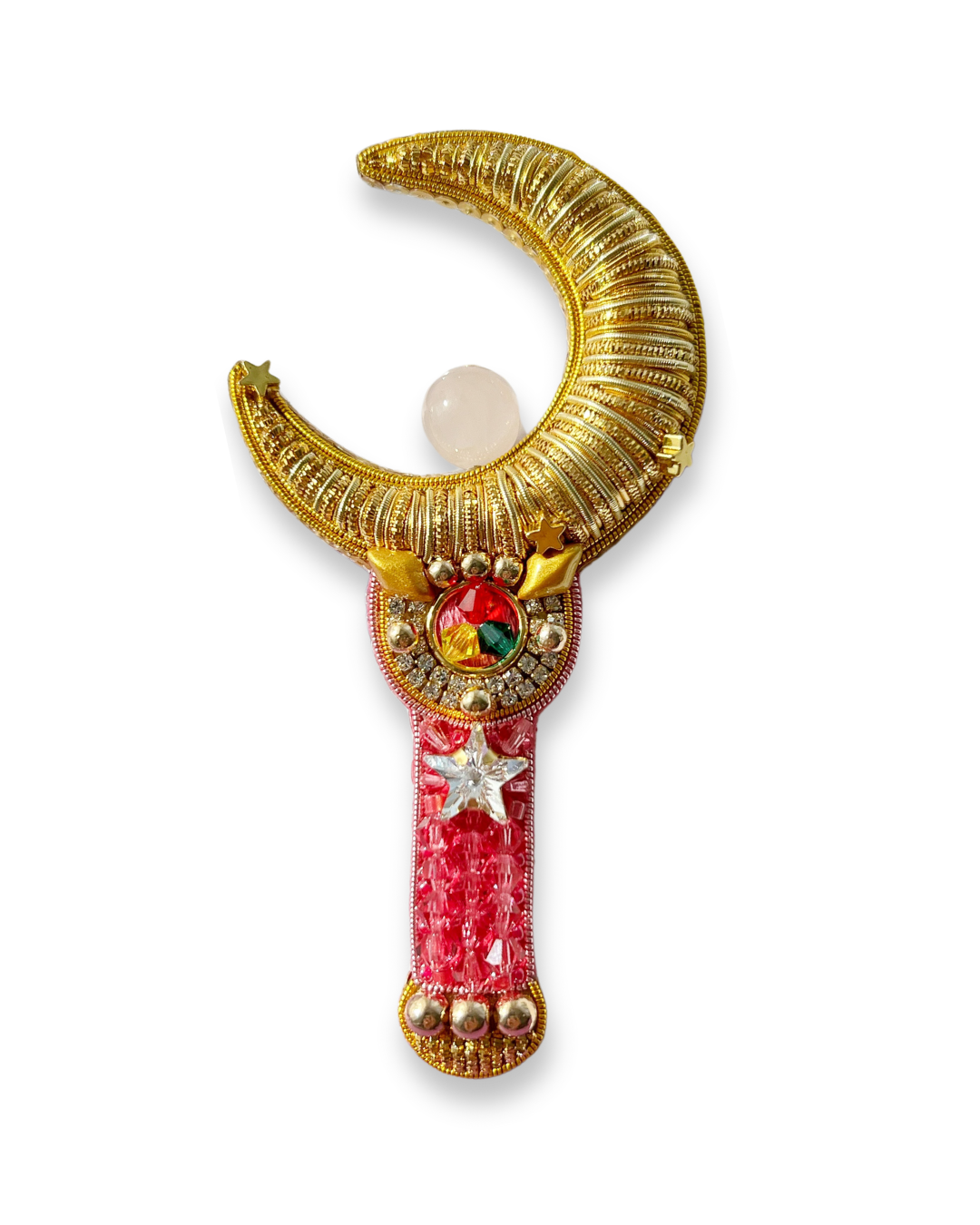 gold embroidered crescent moon with pink stick and quartz crystal