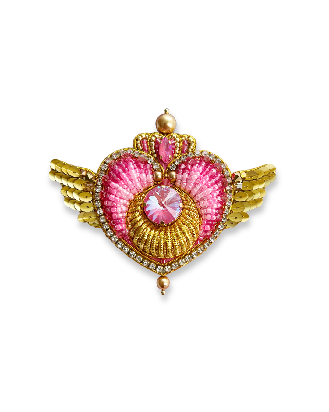 Crisis Moon brooch with pink Swarovski crystal in center and golden beaded wings.