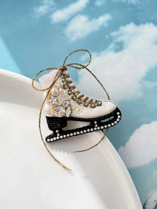 Beaded ice skate brooch with pearls and crystals.