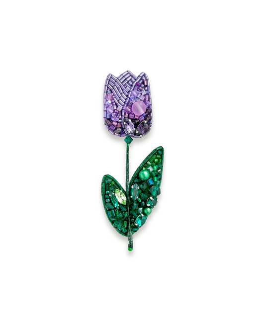 Purple tulip flower brooch with green leaves.