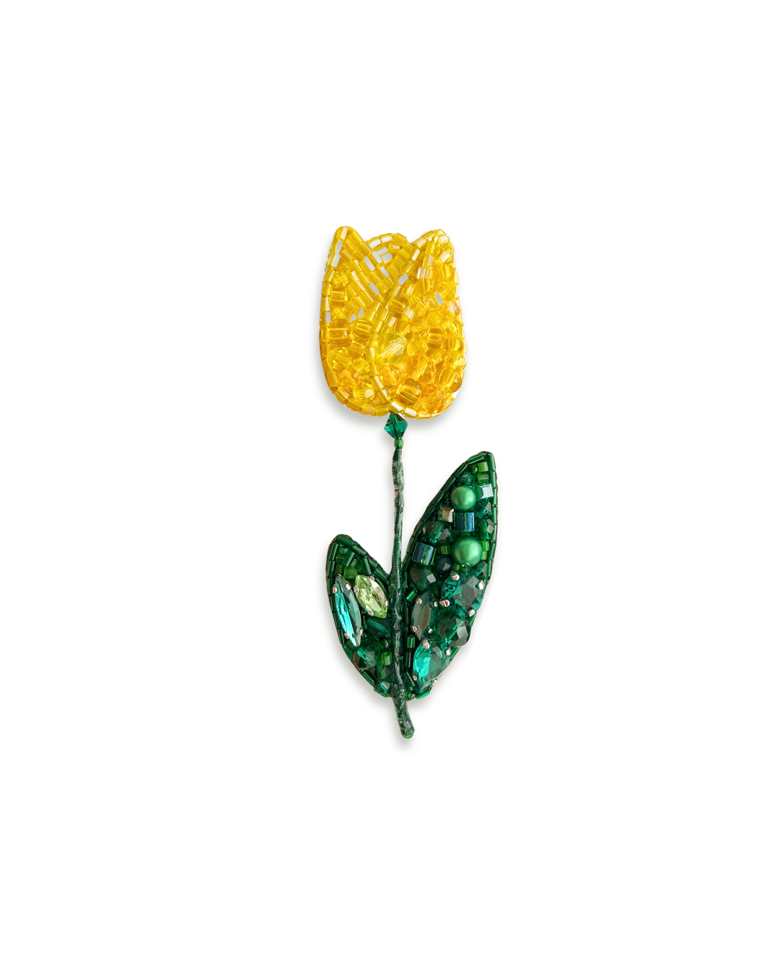 Beaded yellow tulip brooch with green leaves.
